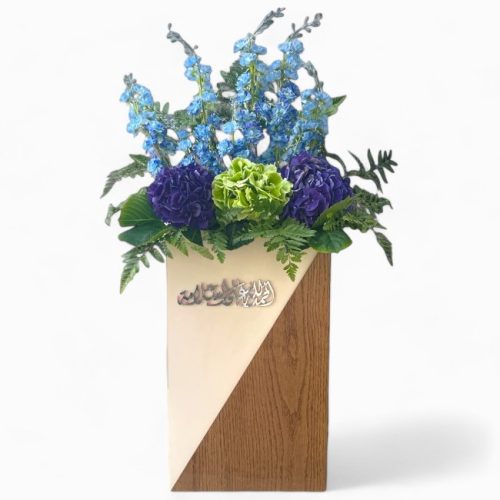 Elegant Blue and Green Floral Arrangement in Wooden Vase