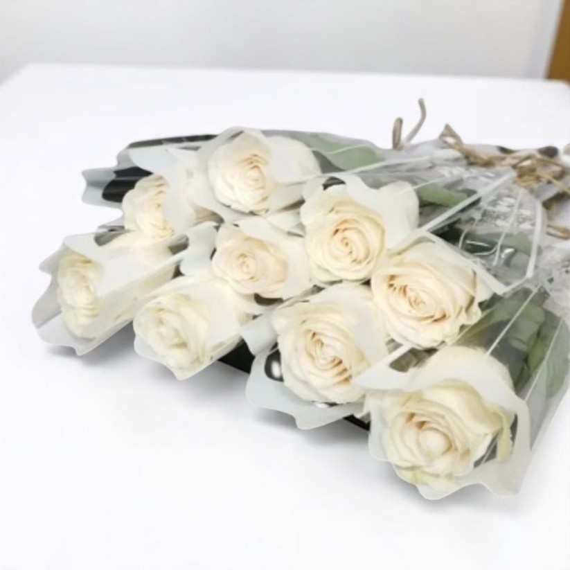 Elegant Single White Rose Wrap โ Kuwait, Corporate event
