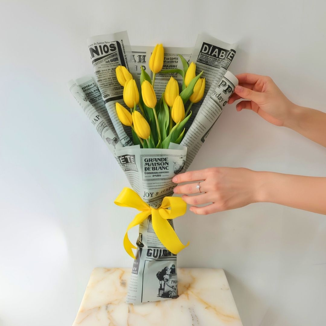 Sunny Yellow Tulip Bouquet in Newspaper Wrap